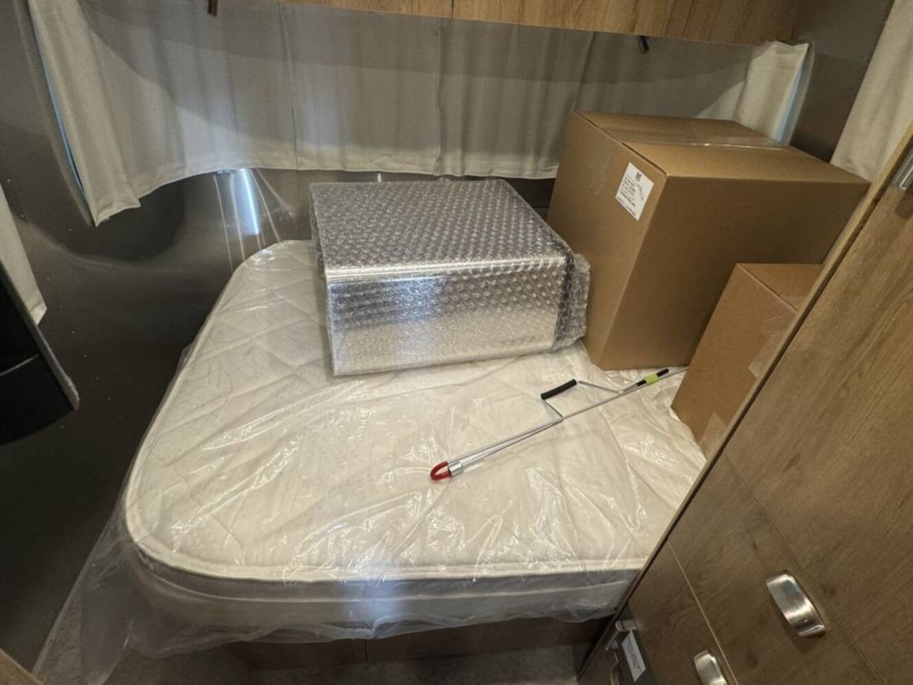 A photo of this 2025 Airstream Trade Wind 23FB