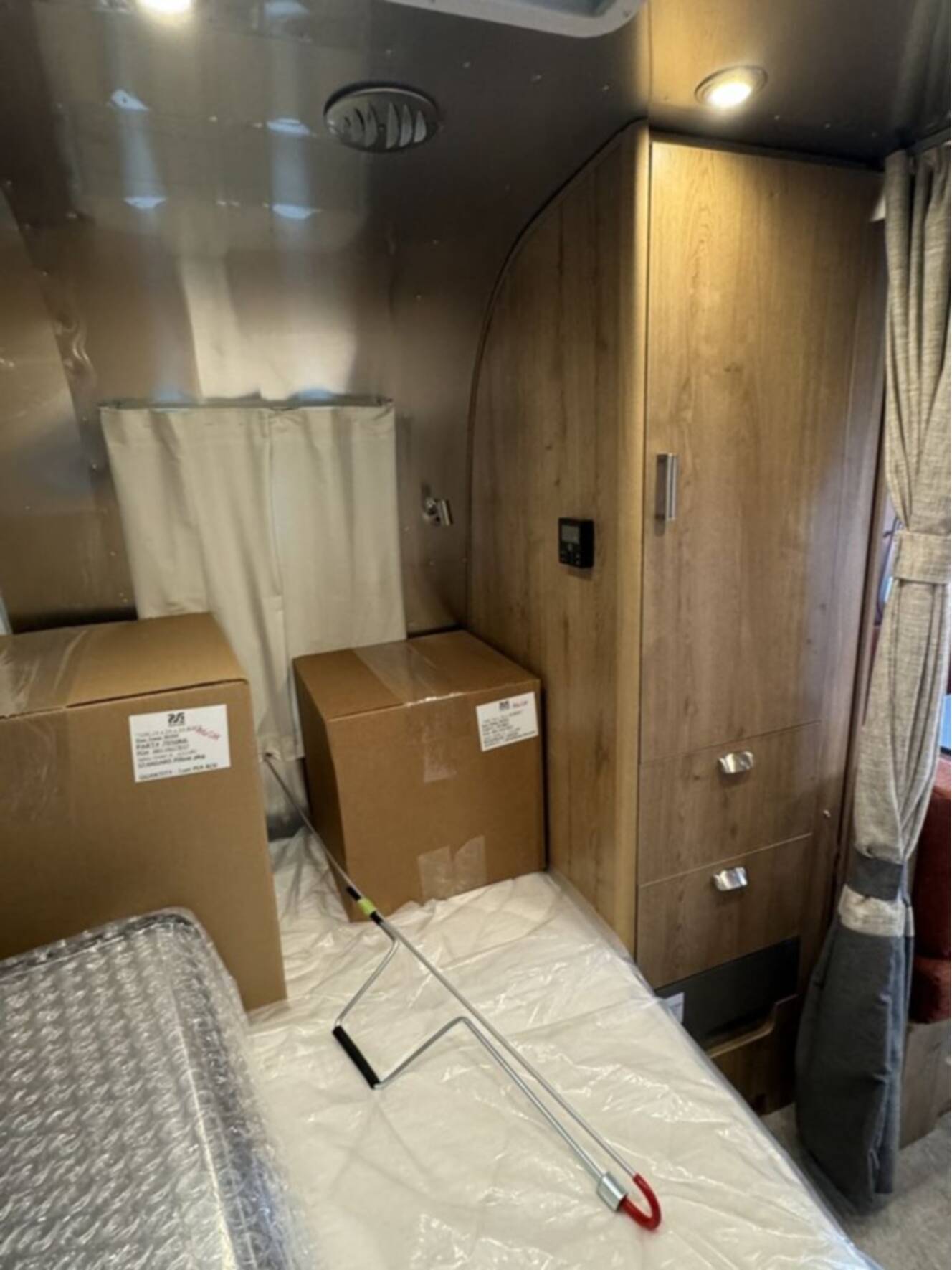 A photo of this 2025 Airstream Trade Wind 23FB