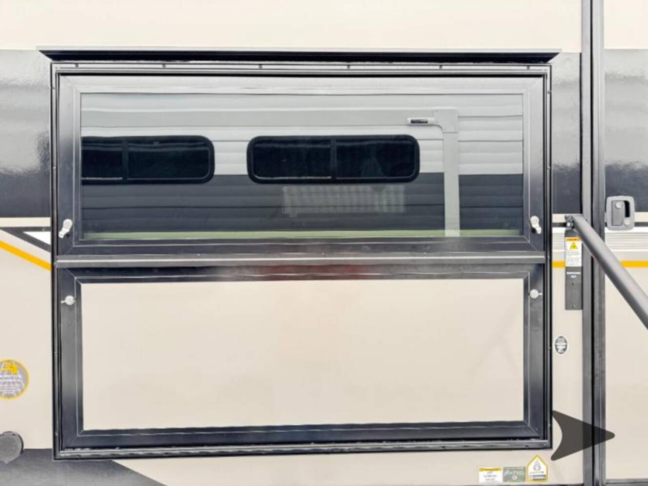 A photo of this 2026 Ember Rv Touring Edition 2300MLL
