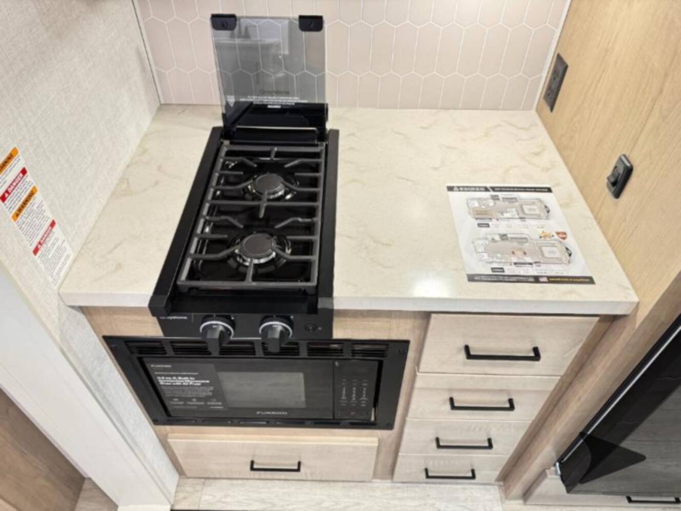 A photo of this 2026 Ember Rv Touring Edition 2300MLL