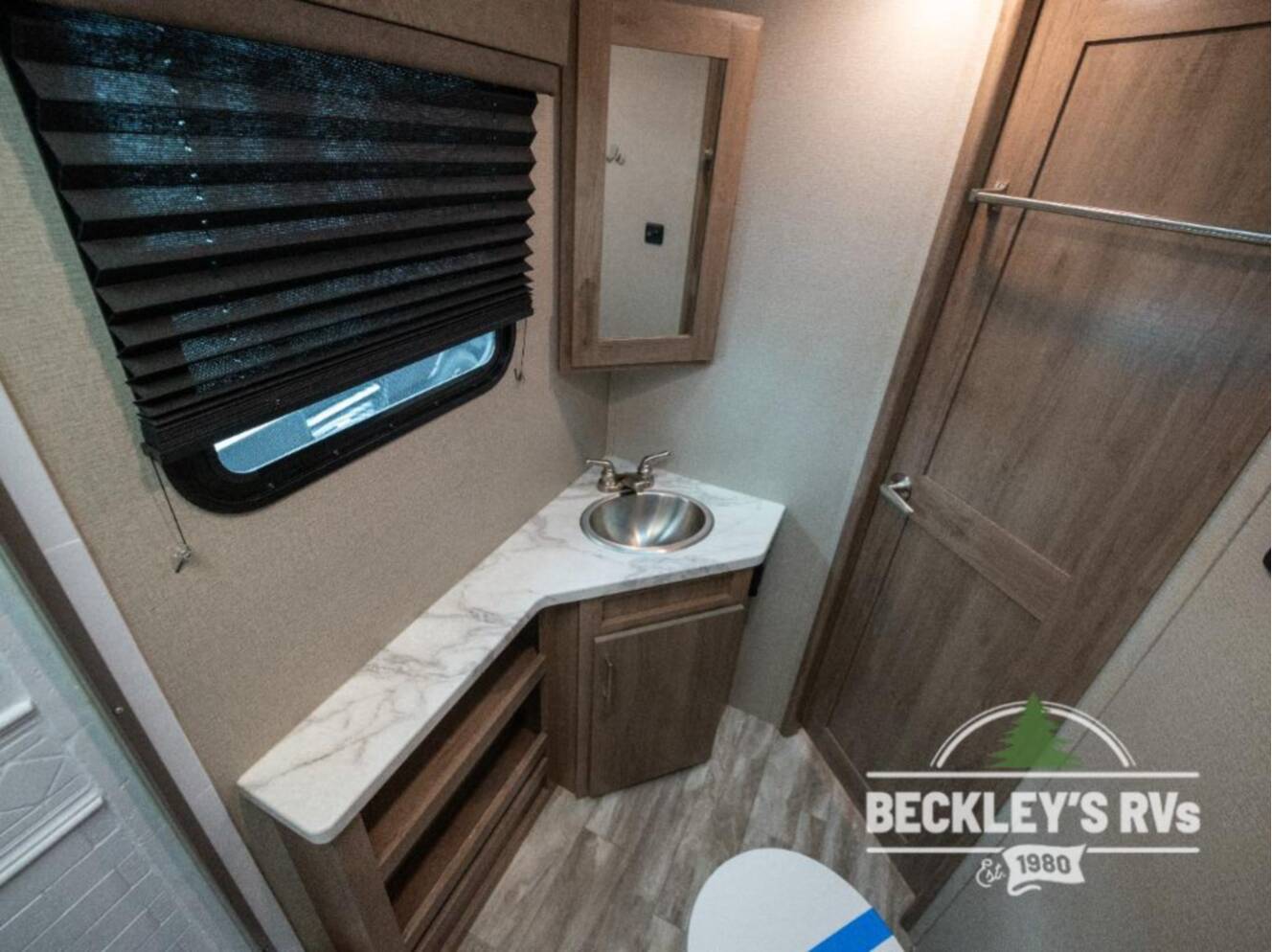 A photo of this 2022 Grand Design Imagine XLS 21BHE