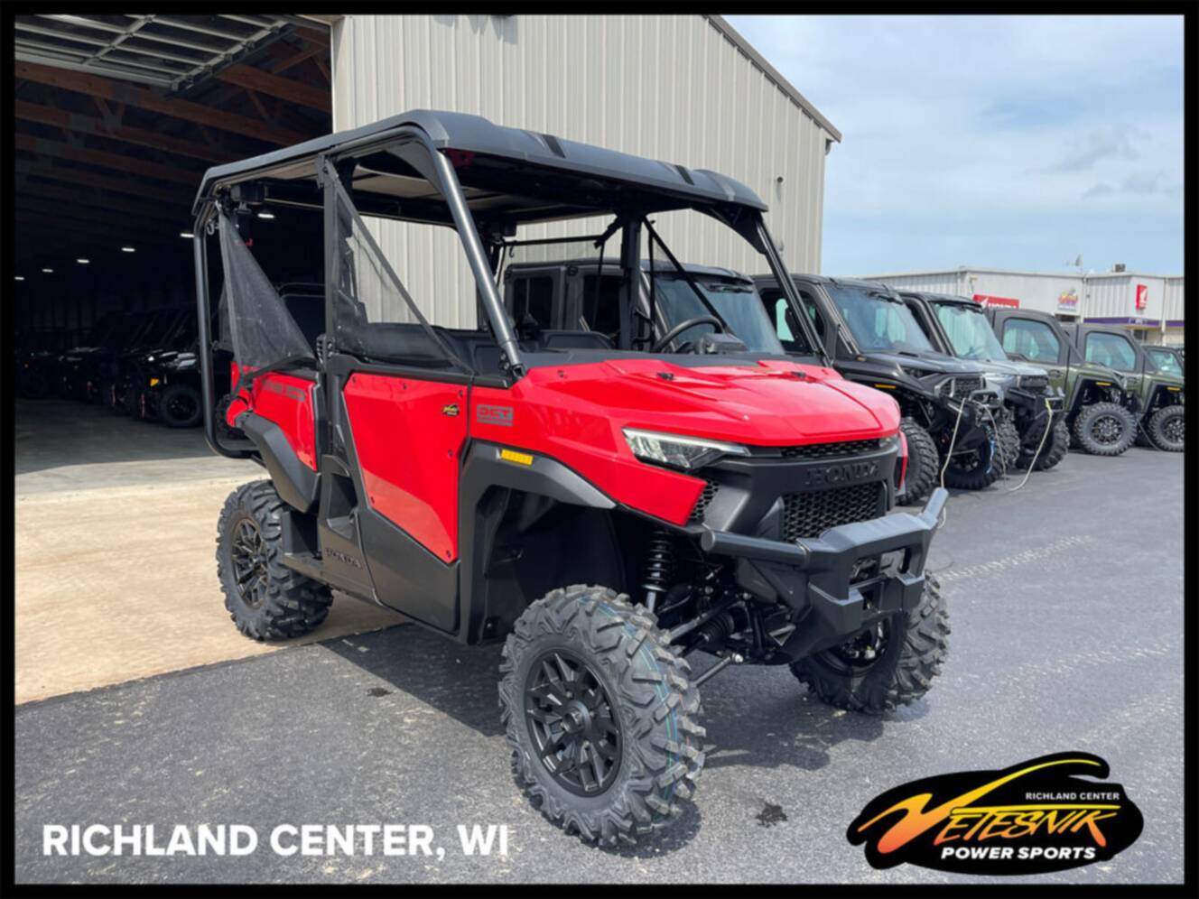 A photo of this 2026 Honda® Pioneer 1000-5 Deluxe
