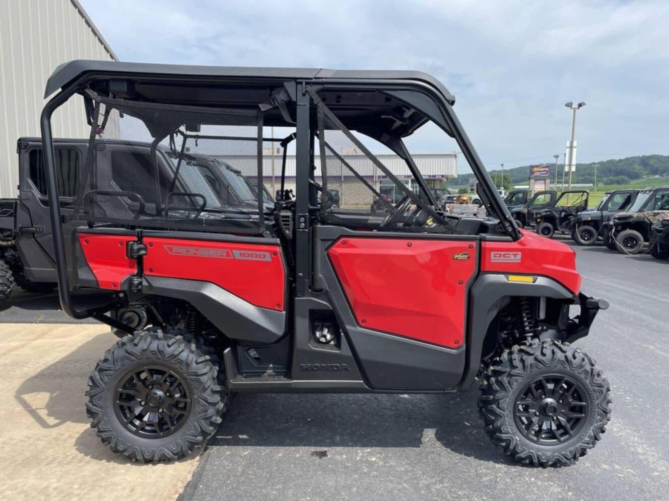 A photo of this 2026 Honda® Pioneer 1000-5 Deluxe