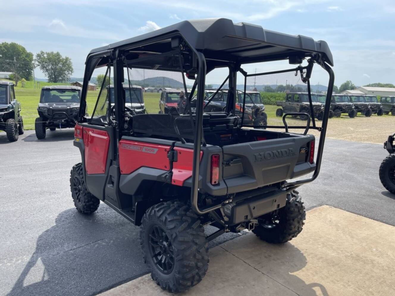 A photo of this 2026 Honda® Pioneer 1000-5 Deluxe