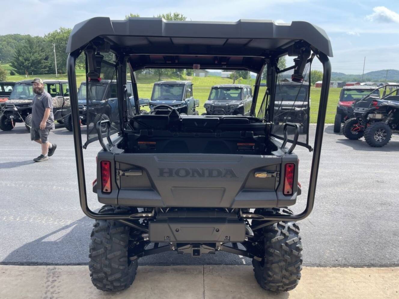 A photo of this 2026 Honda® Pioneer 1000-5 Deluxe
