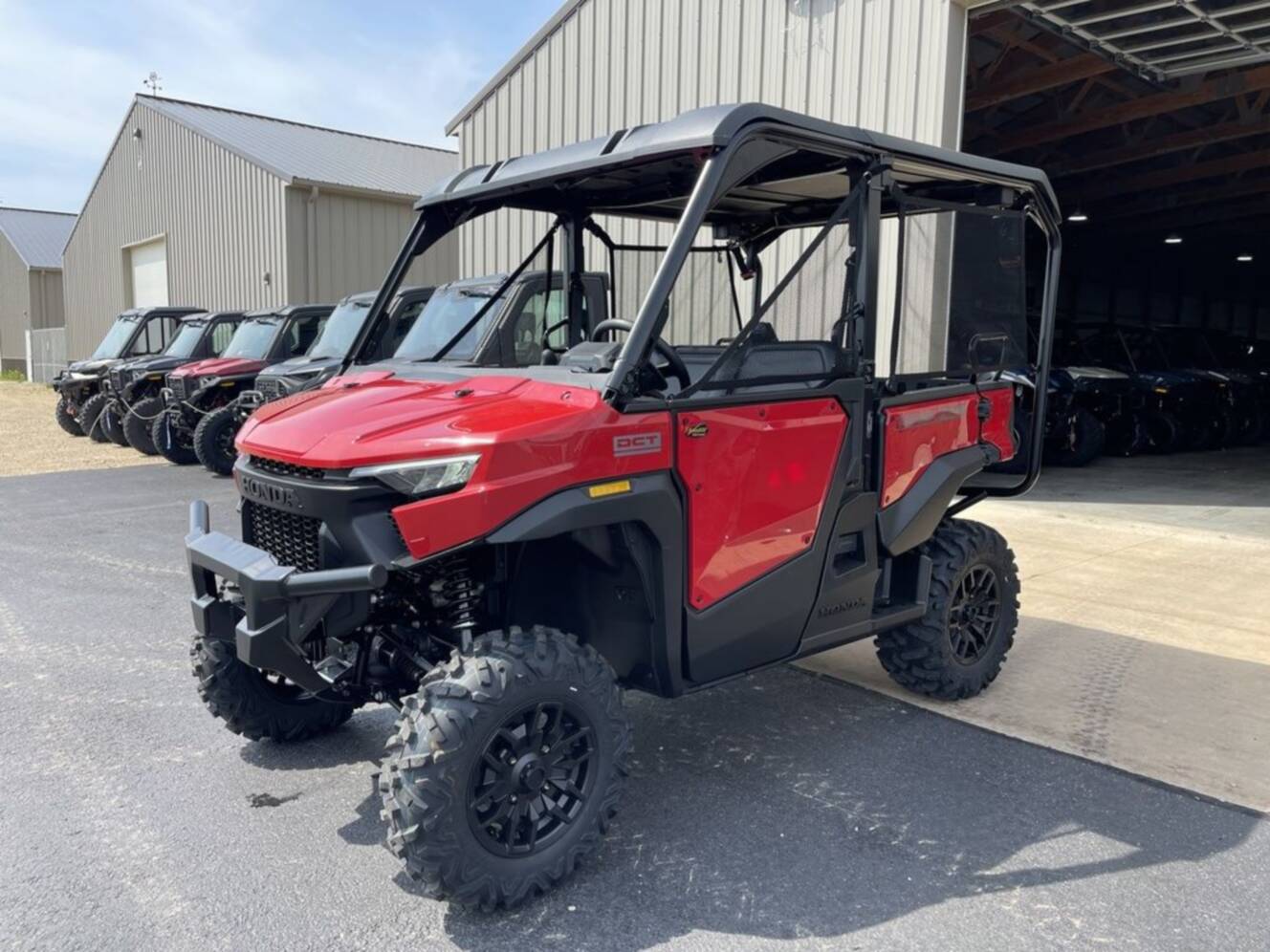 A photo of this 2026 Honda® Pioneer 1000-5 Deluxe