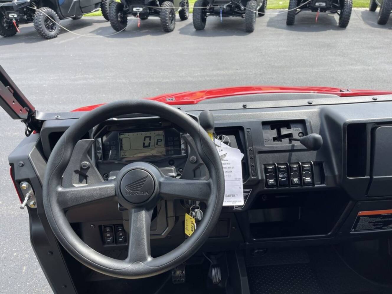 A photo of this 2026 Honda® Pioneer 1000-5 Deluxe