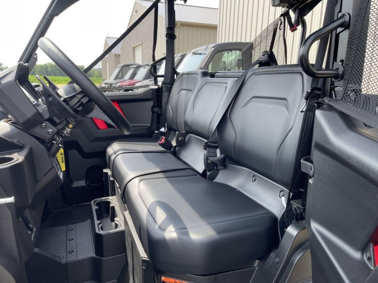 A photo of this 2026 Honda® Pioneer 1000-5 Deluxe