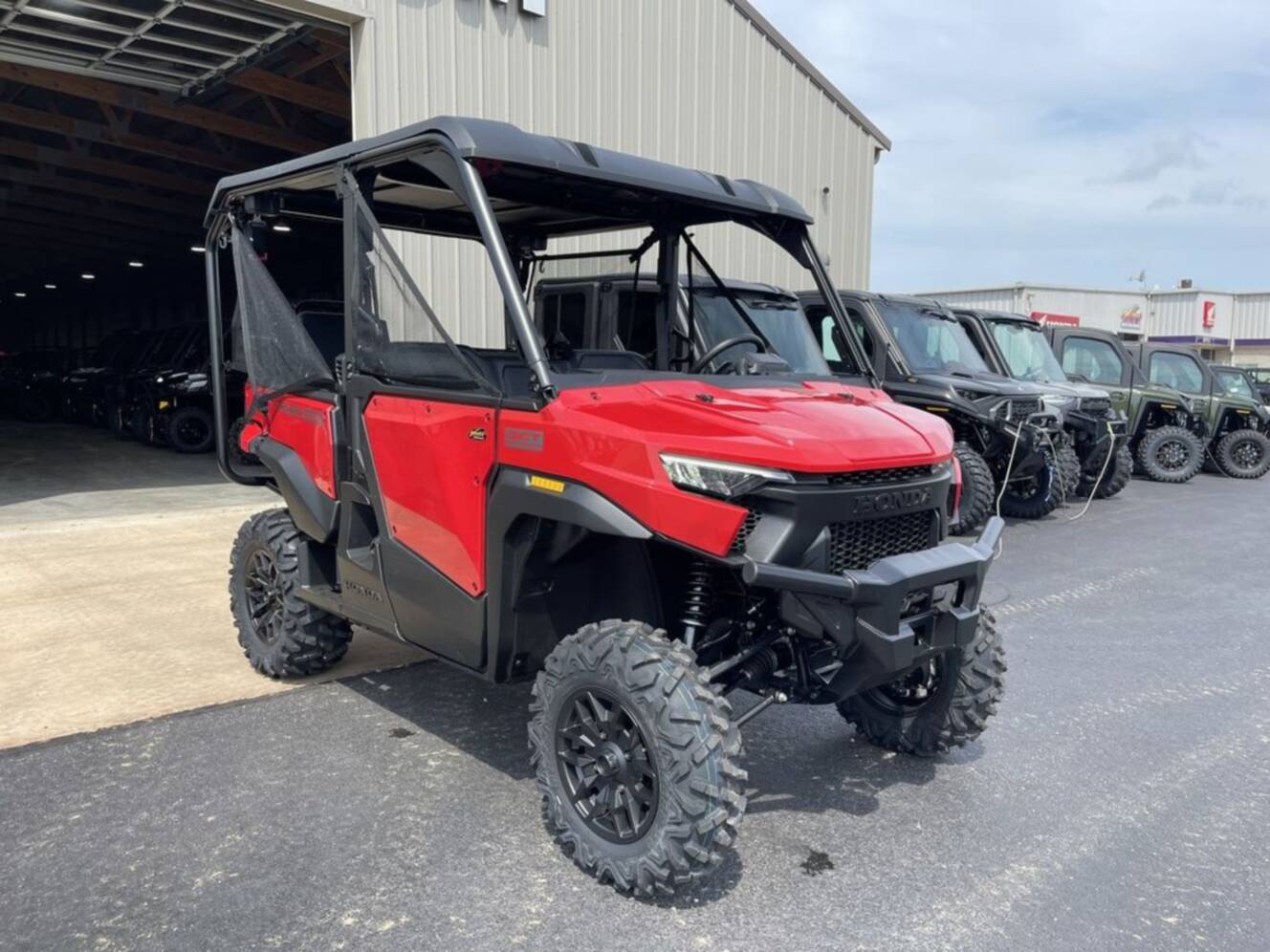 A photo of this 2026 Honda® Pioneer 1000-5 Deluxe