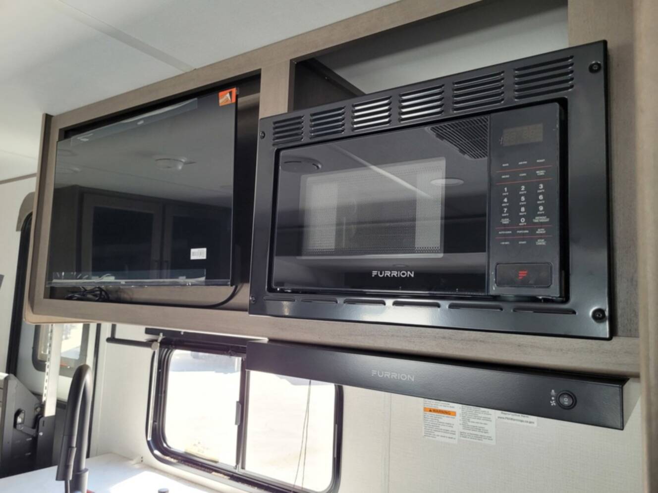 A photo of this 2026 Grand Design Transcend 325BHT