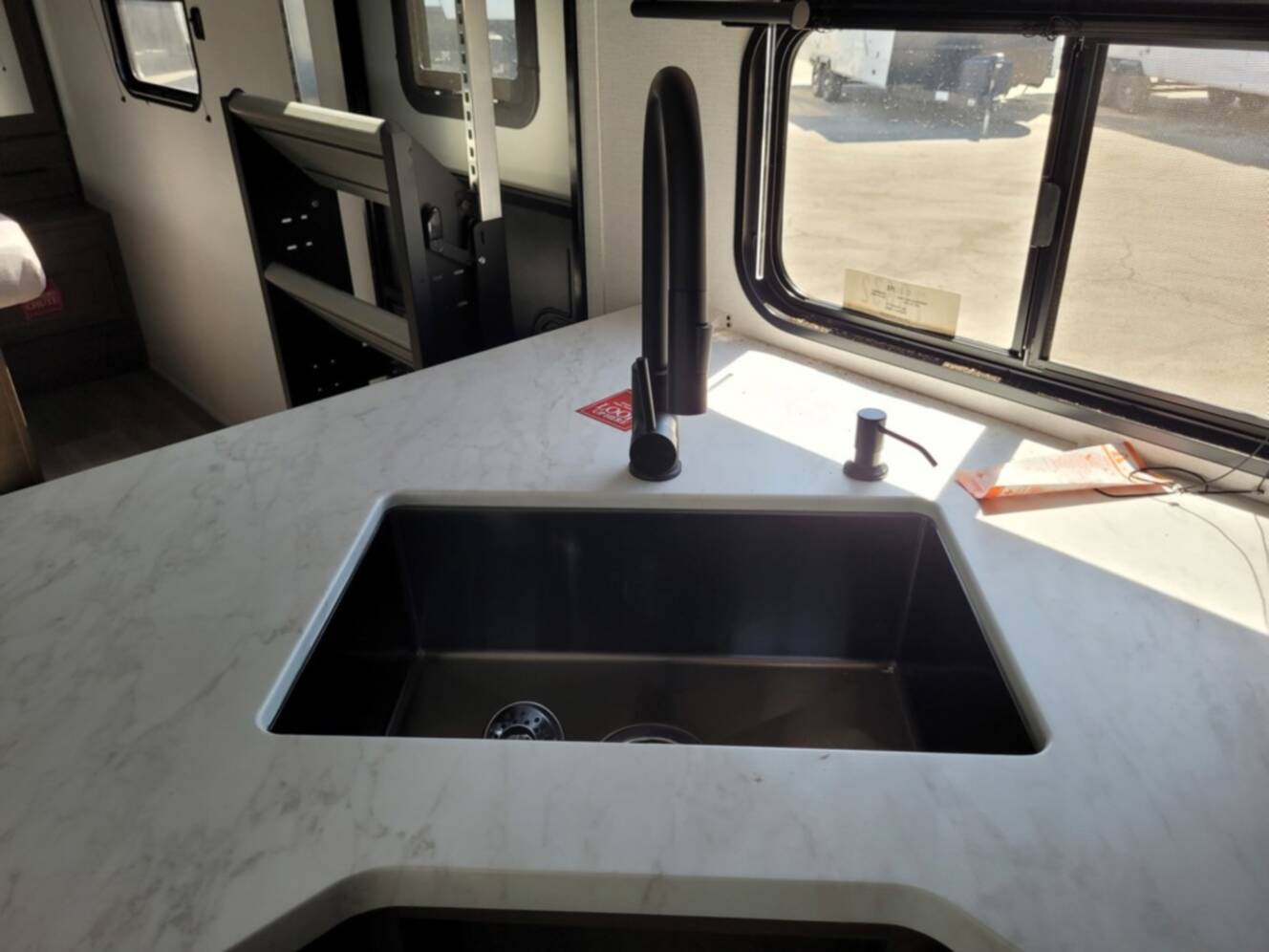A photo of this 2026 Grand Design Transcend 325BHT