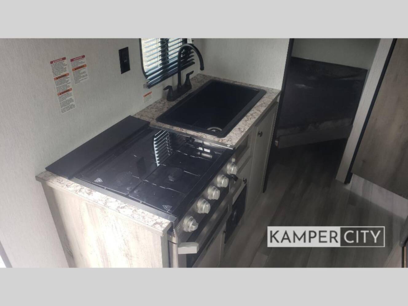 A photo of this 2026 Sunset Park Rv Sun Lite LTD 21DB