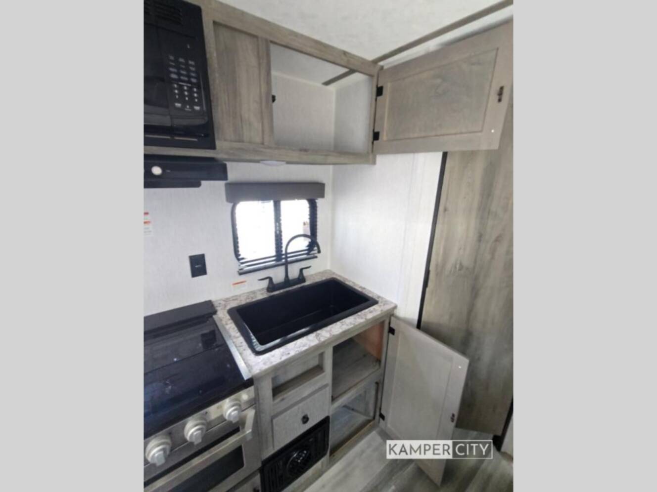 A photo of this 2026 Sunset Park Rv Sun Lite LTD 21DO