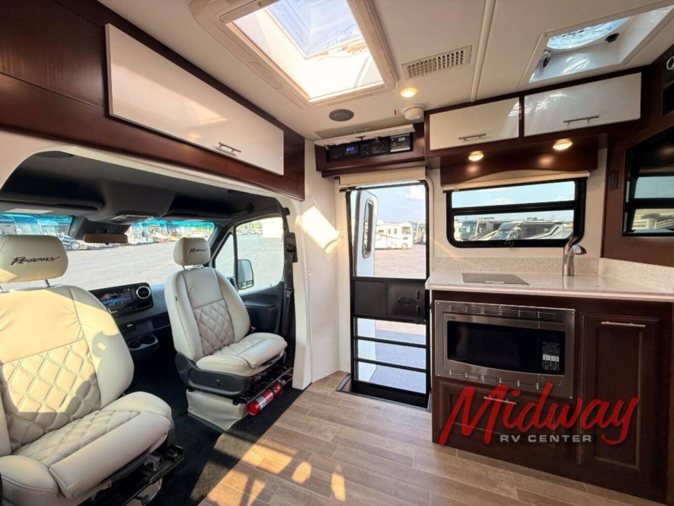 A photo of this 2021 Regency Rv Ultra Brougham UB25TBS