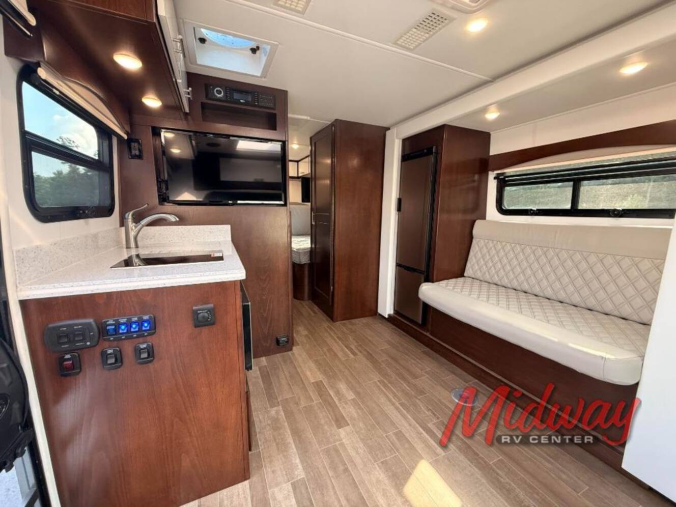 A photo of this 2021 Regency Rv Ultra Brougham UB25TBS
