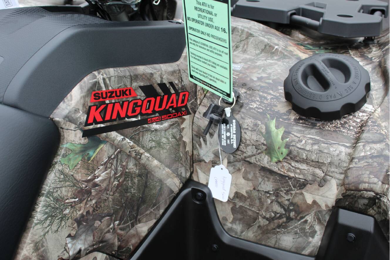 A photo of this 2026 Suzuki KingQuad 500AXi Power Steering SE Camo