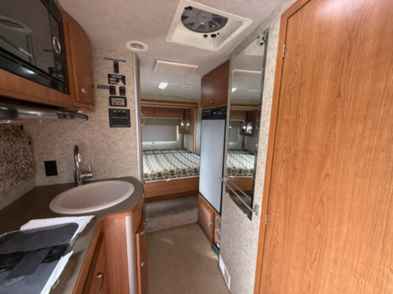 A photo of this 2009 Itasca Navion iQ 24DL