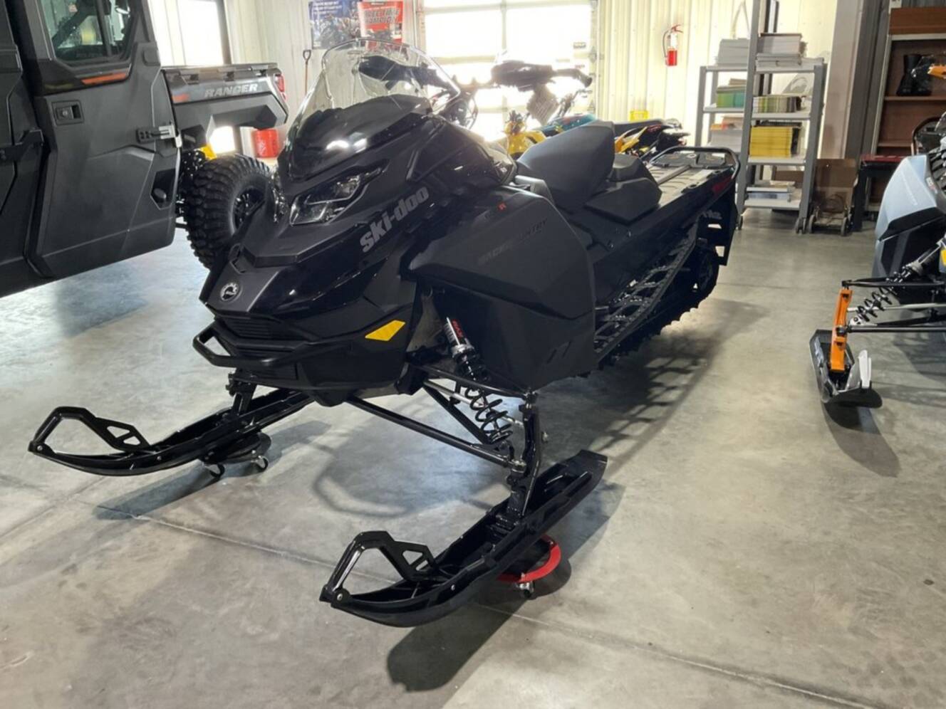 A photo of this 2026 Ski-Doo Backcountry Adrenaline® 600R E-TEC Storm 1.5_Black