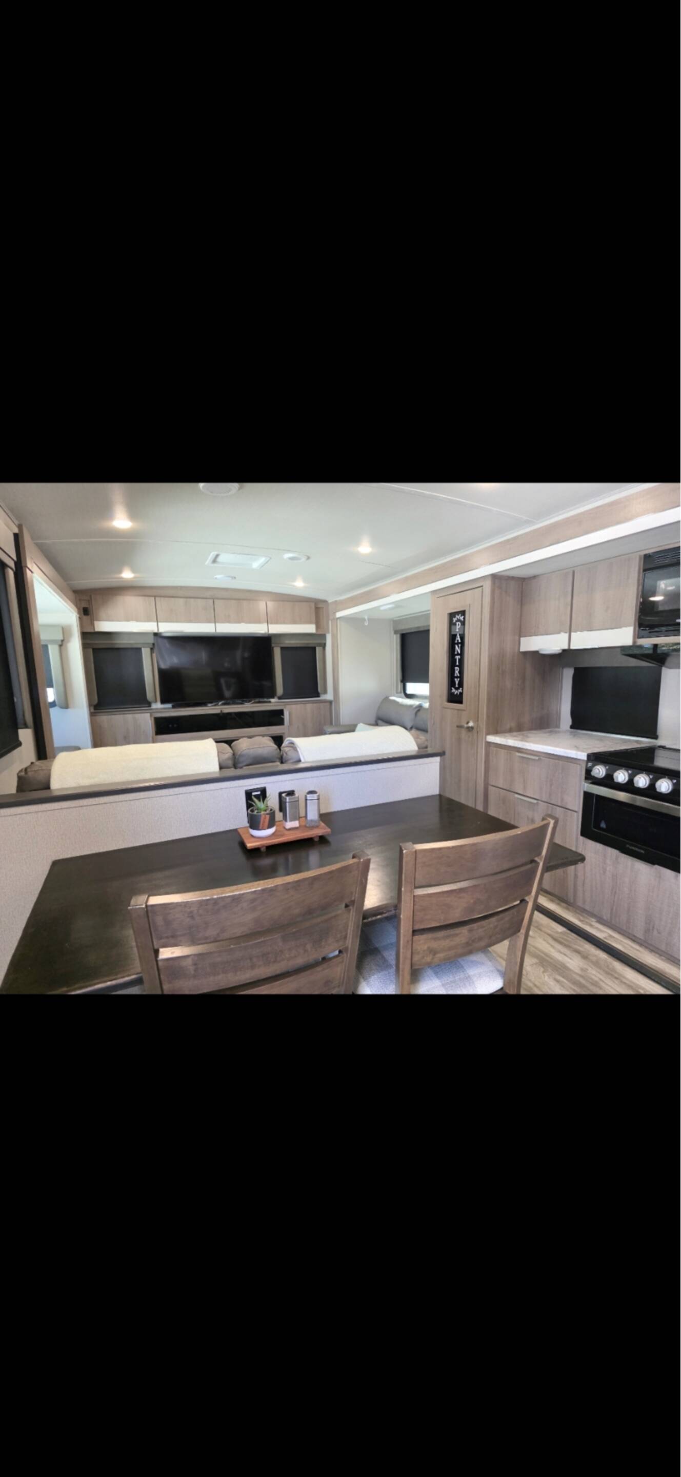 A photo of this 2021 Grand Design IMAGINE 3100RD