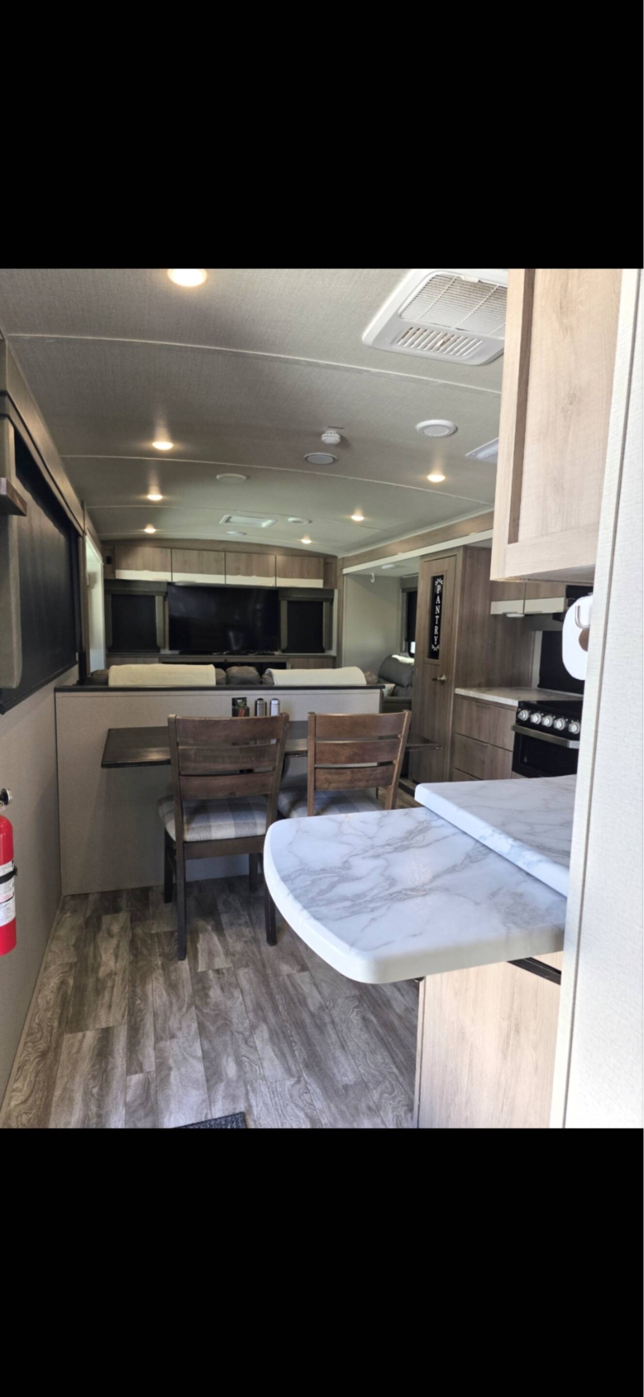 A photo of this 2021 Grand Design IMAGINE 3100RD