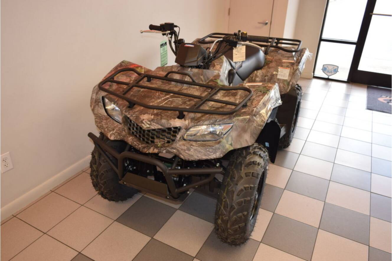 A photo of this 2025 Suzuki KingQuad 400ASi Camo