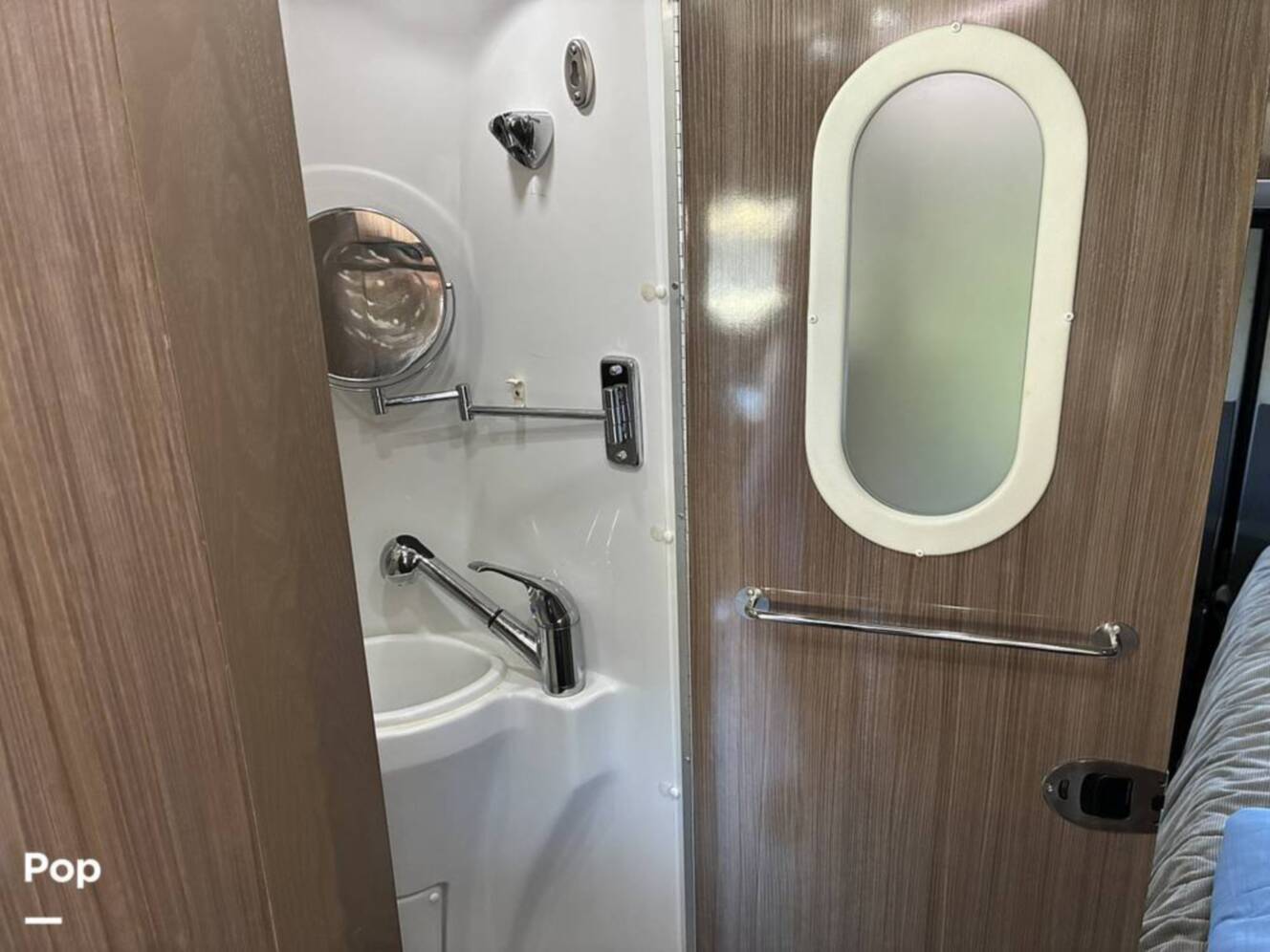 A photo of this 2017 Airstream Interstate EXT Lounge Twin Wardrobe