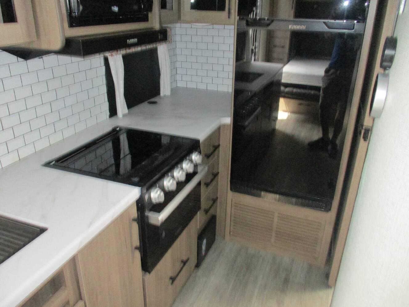 A photo of this 2023 Grand Design Imagine XLS 17MKE