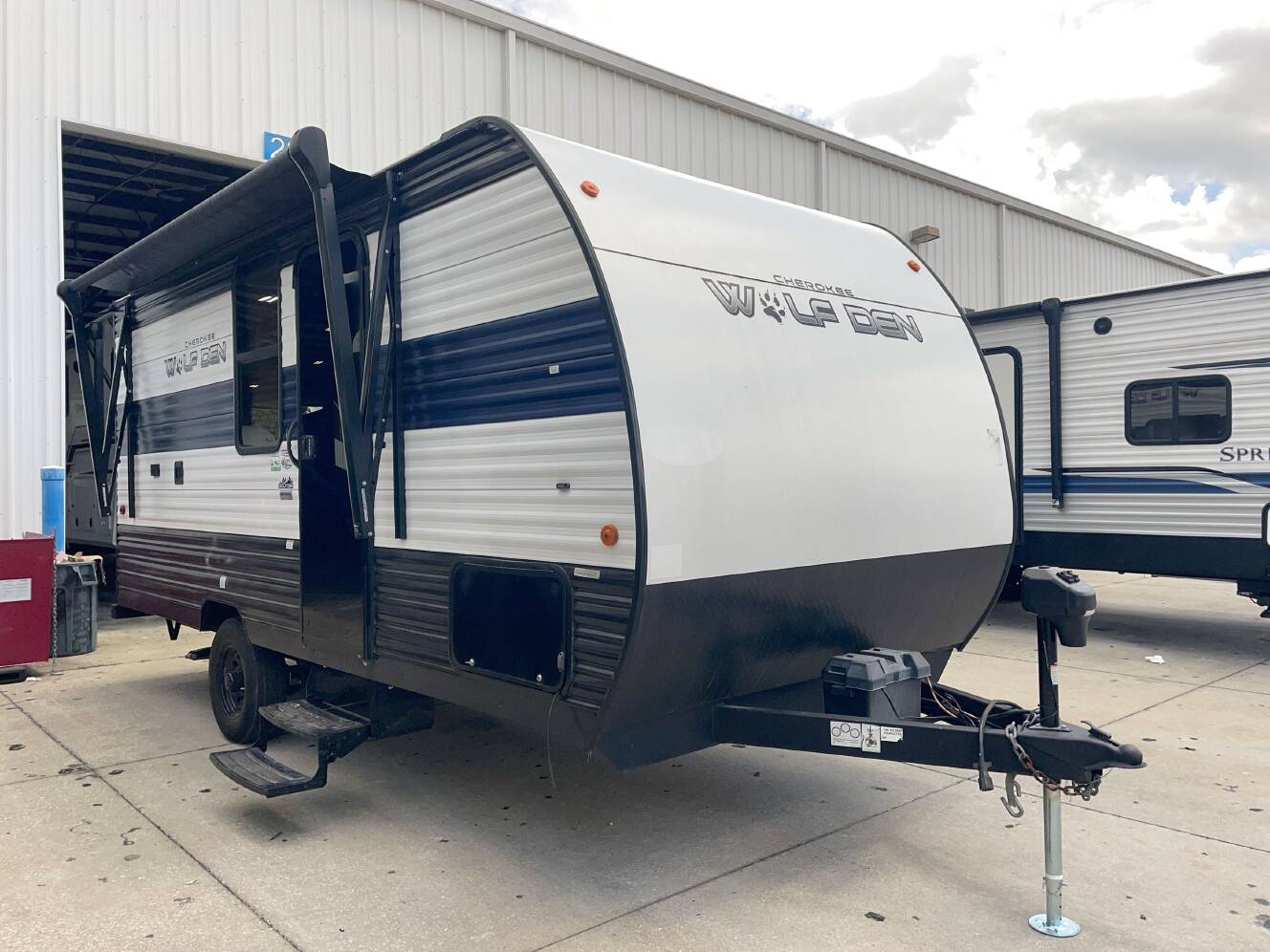 A photo of this 2024 Forest River WOLF DEN 16EV