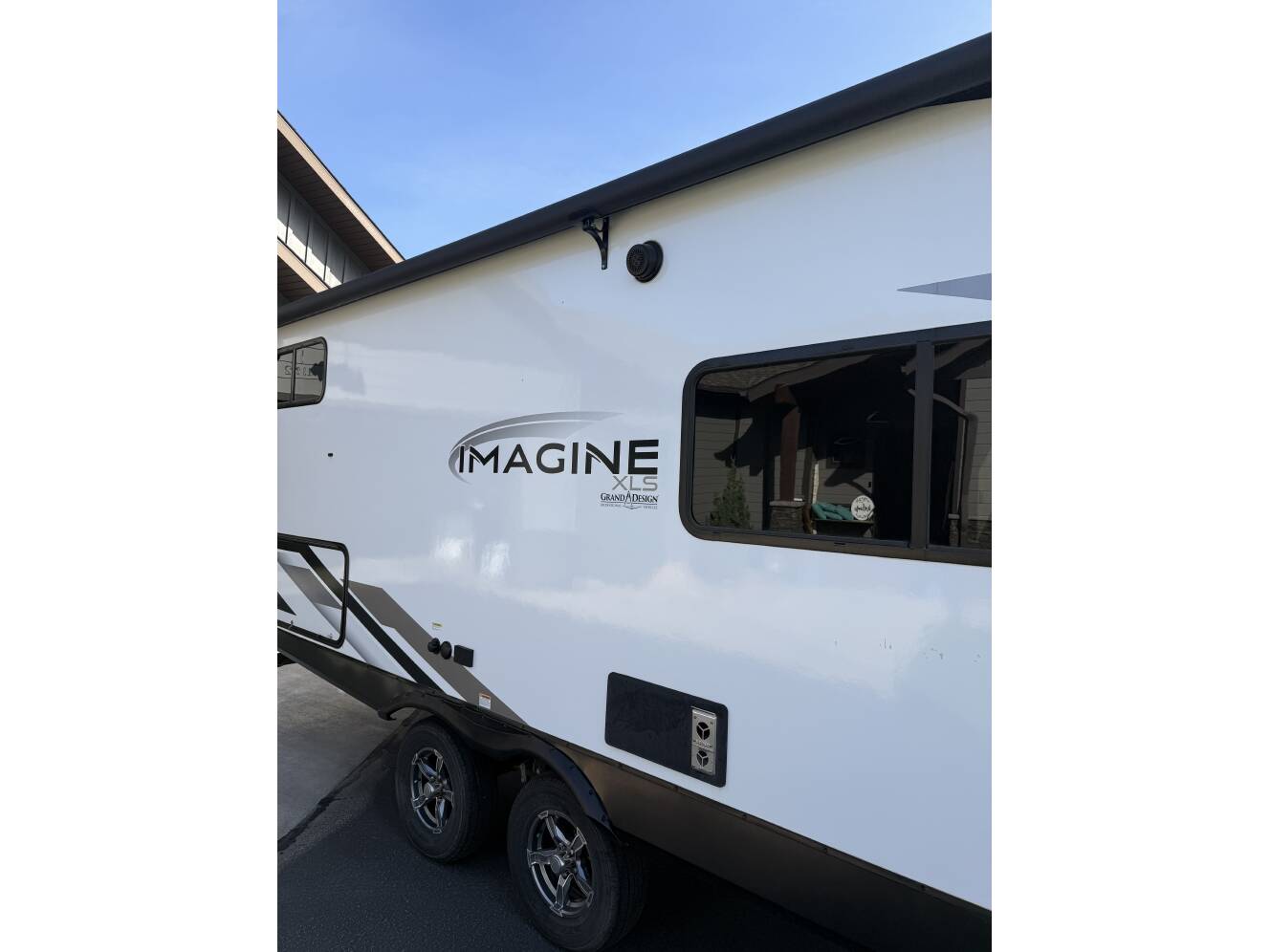 A photo of this 2023 Grand Design IMAGINE XLS 25BHE
