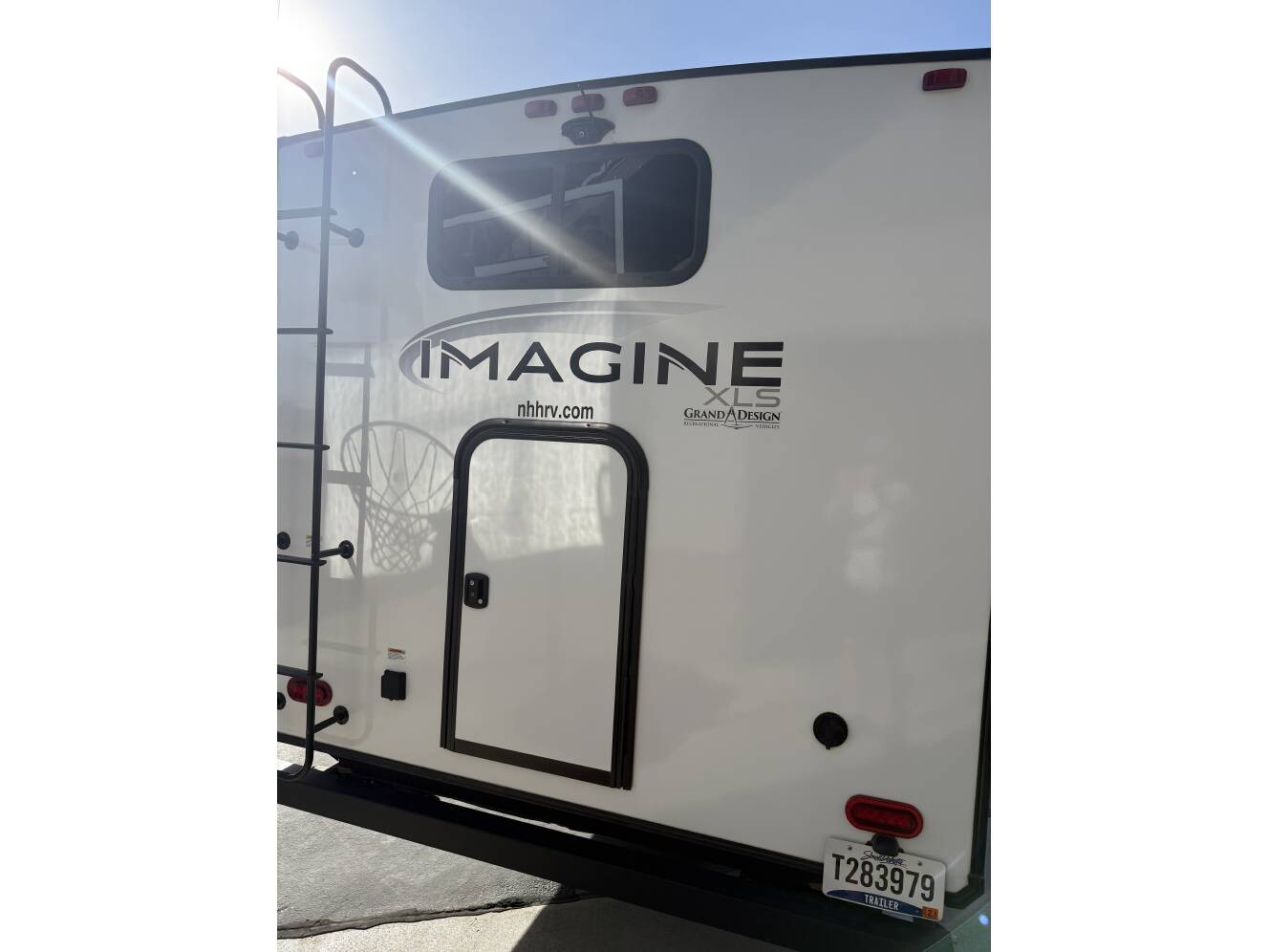 A photo of this 2023 Grand Design IMAGINE XLS 25BHE