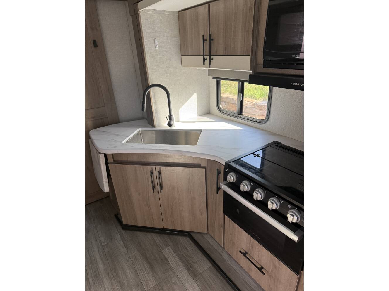 A photo of this 2023 Grand Design IMAGINE XLS 25BHE