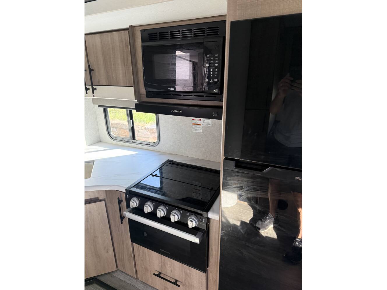 A photo of this 2023 Grand Design IMAGINE XLS 25BHE