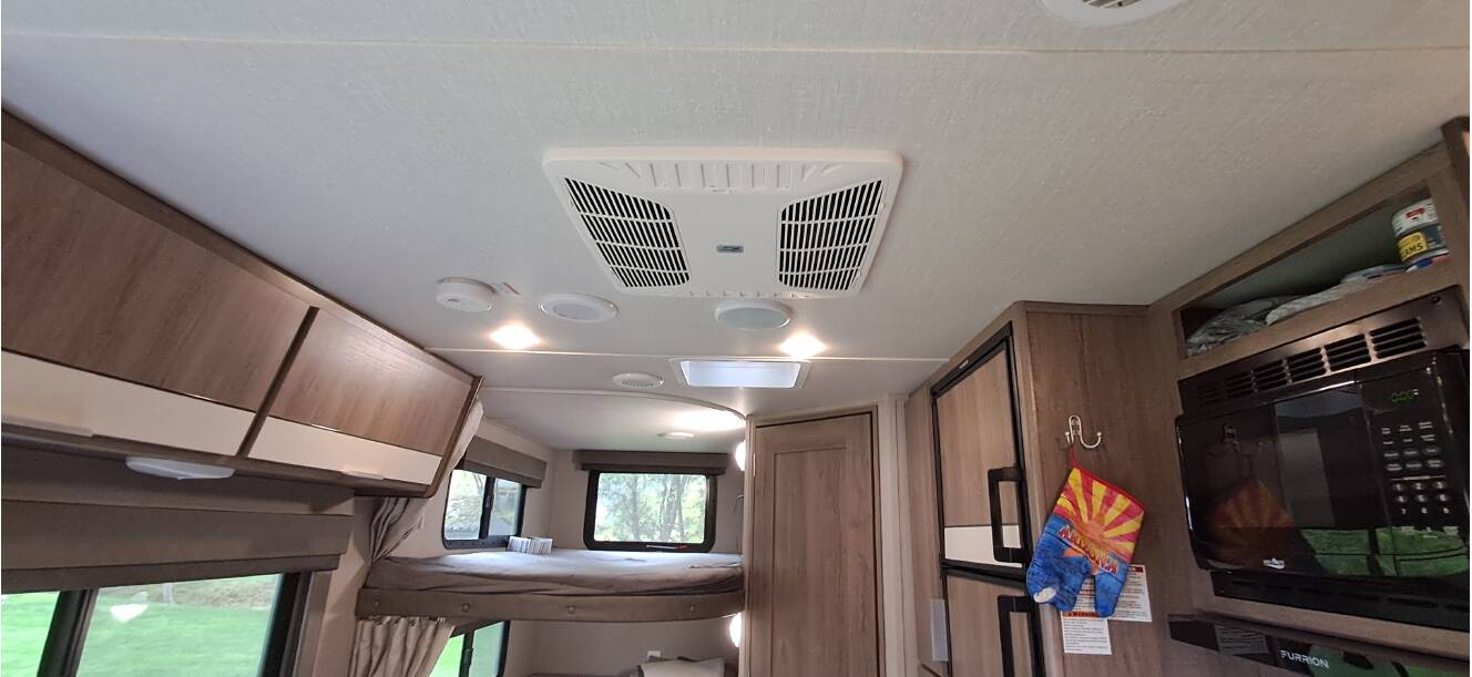 A photo of this 2021 Grand Design IMAGINE XLS 21BHE
