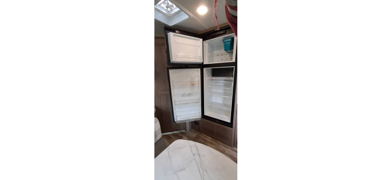 A photo of this 2021 Grand Design IMAGINE XLS 21BHE