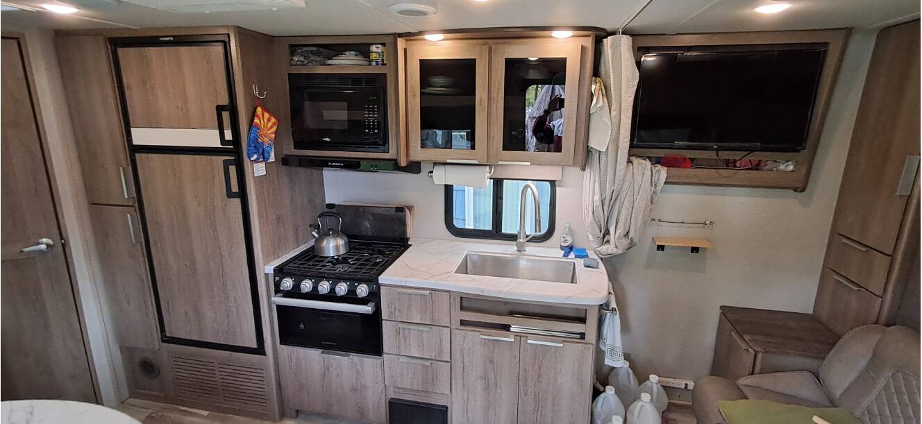 A photo of this 2021 Grand Design IMAGINE XLS 21BHE