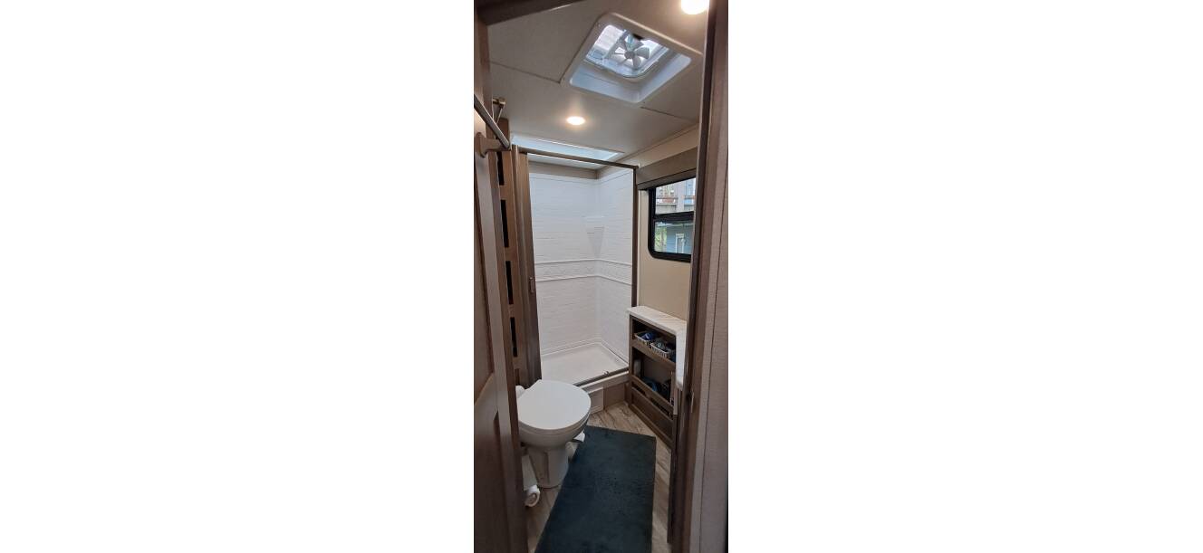 A photo of this 2021 Grand Design IMAGINE XLS 21BHE