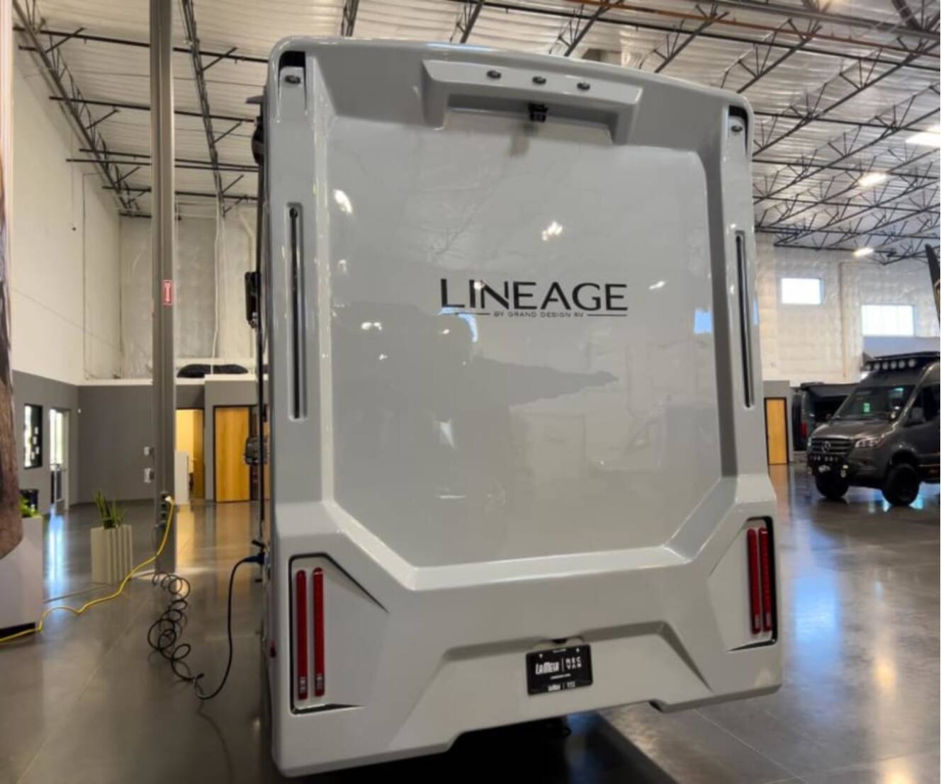 A photo of this 2026 Grand Design LINEAGE SERIES M 25TK-FBP