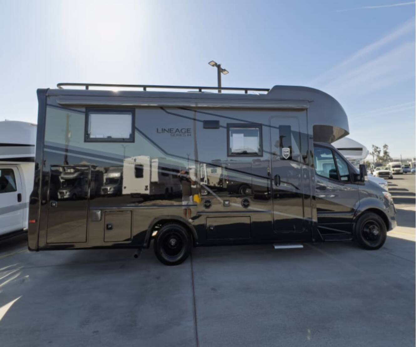 A photo of this 2026 Grand Design LINEAGE SERIES M 25TK-FBP