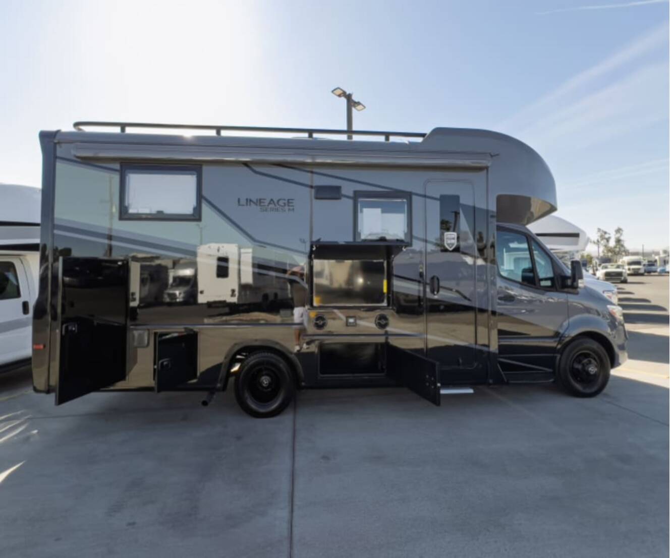 A photo of this 2026 Grand Design LINEAGE SERIES M 25TK-FBP