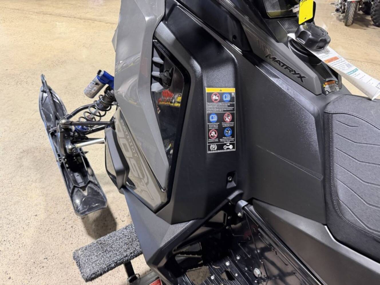 A photo of this 2025 Polaris® Boost Switchback Assault 146 Shadow Gray / Gloss Black