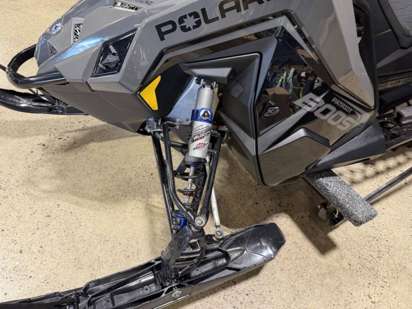 A photo of this 2025 Polaris® Boost Switchback Assault 146 Shadow Gray / Gloss Black