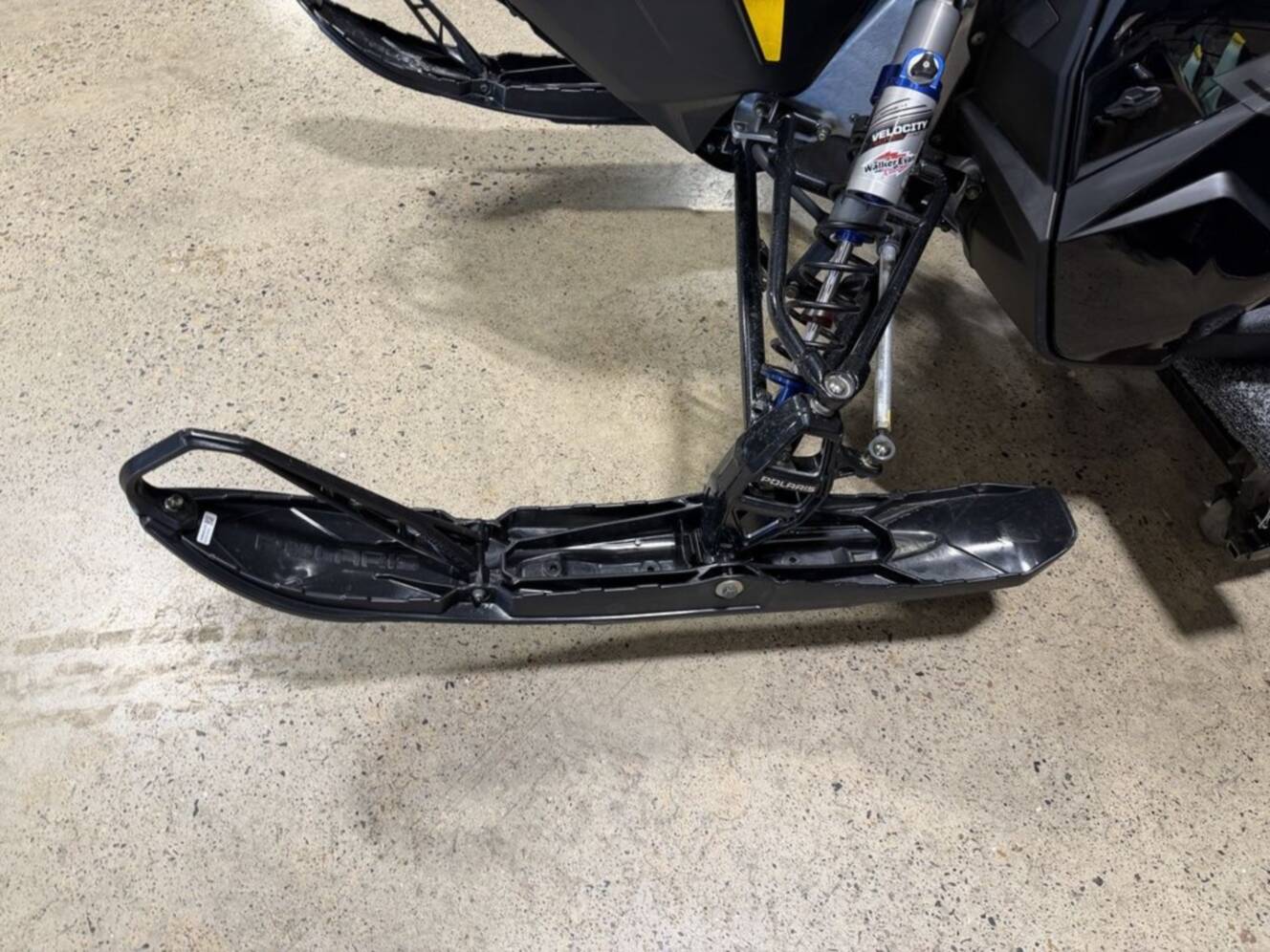 A photo of this 2025 Polaris® Boost Switchback Assault 146 Shadow Gray / Gloss Black