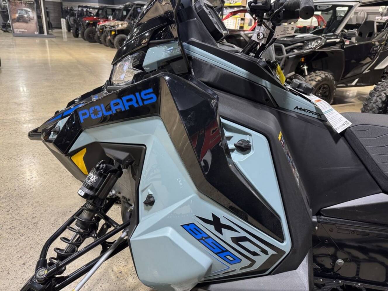 A photo of this 2026 Polaris® 850 INDY XC 137 Hemlock Blue / Black / Velocity Blue