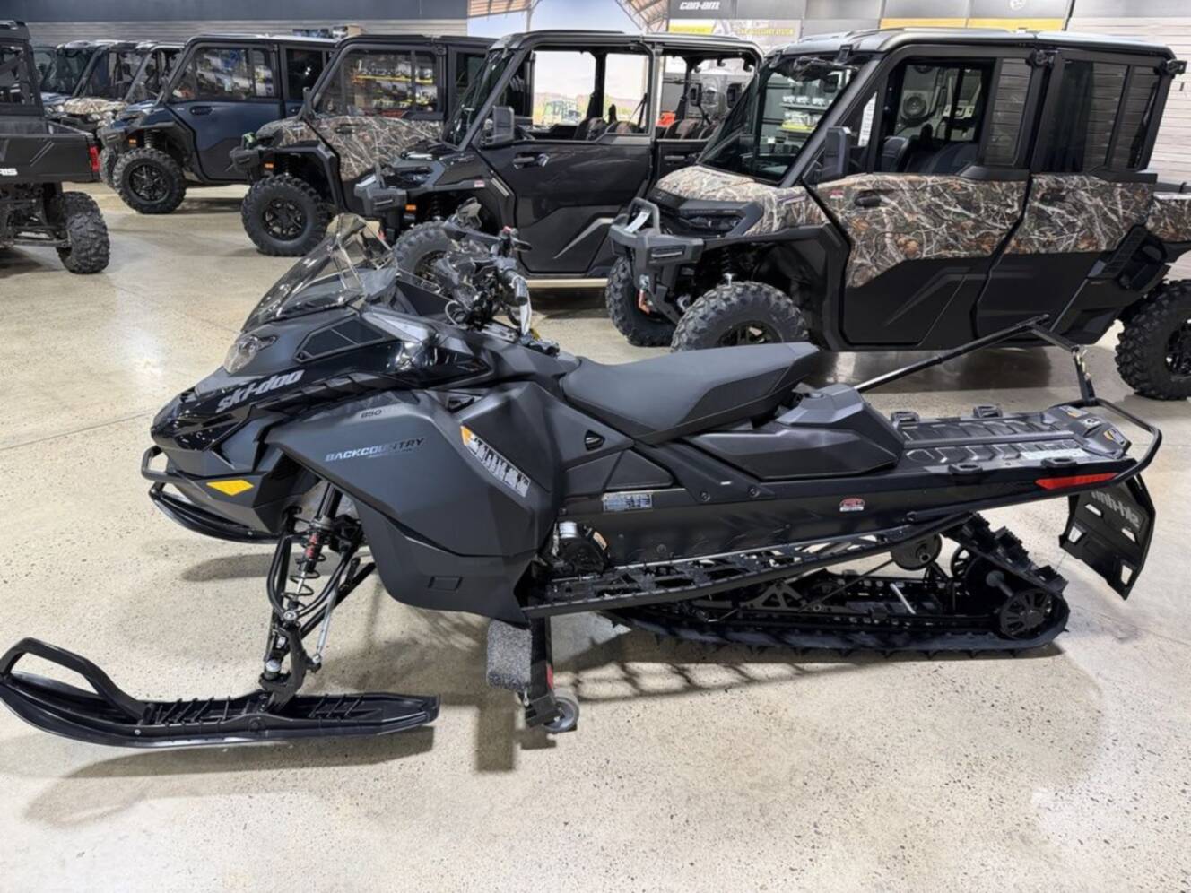 A photo of this 2026 Ski-Doo Backcountry Adrenaline® 850 E-TEC Storm 1.5_Black