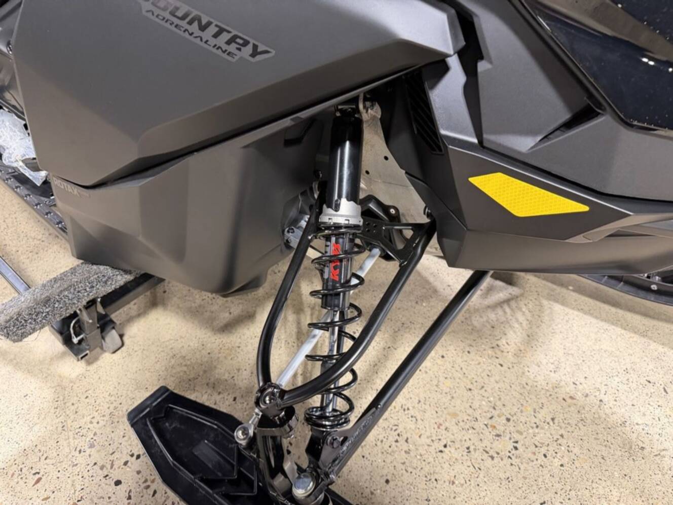 A photo of this 2026 Ski-Doo Backcountry Adrenaline® 850 E-TEC Storm 1.5_Black