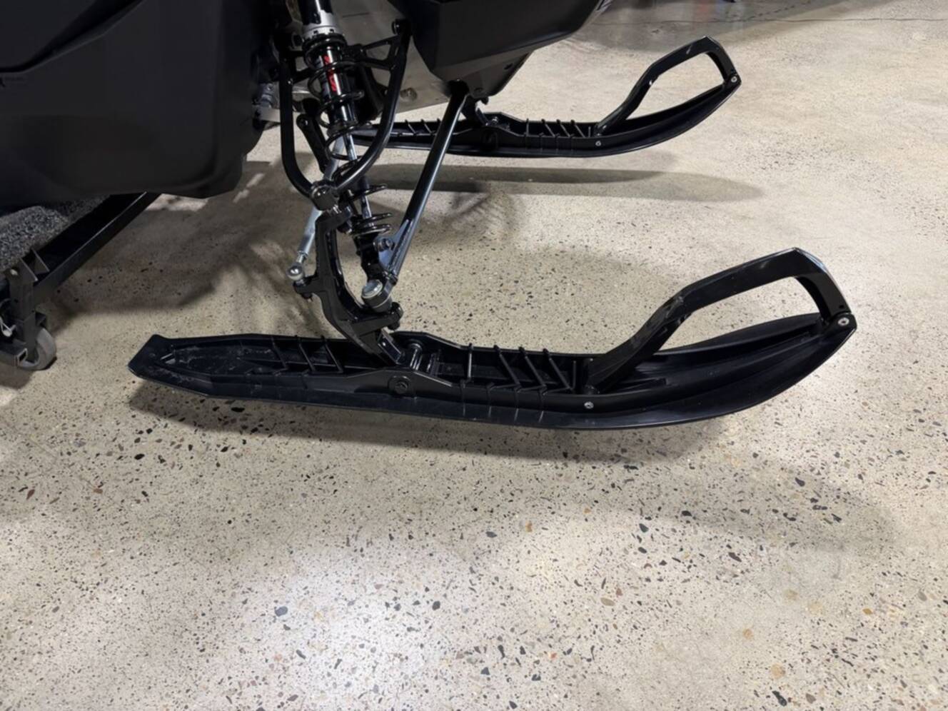 A photo of this 2026 Ski-Doo Backcountry Adrenaline® 850 E-TEC Storm 1.5_Black