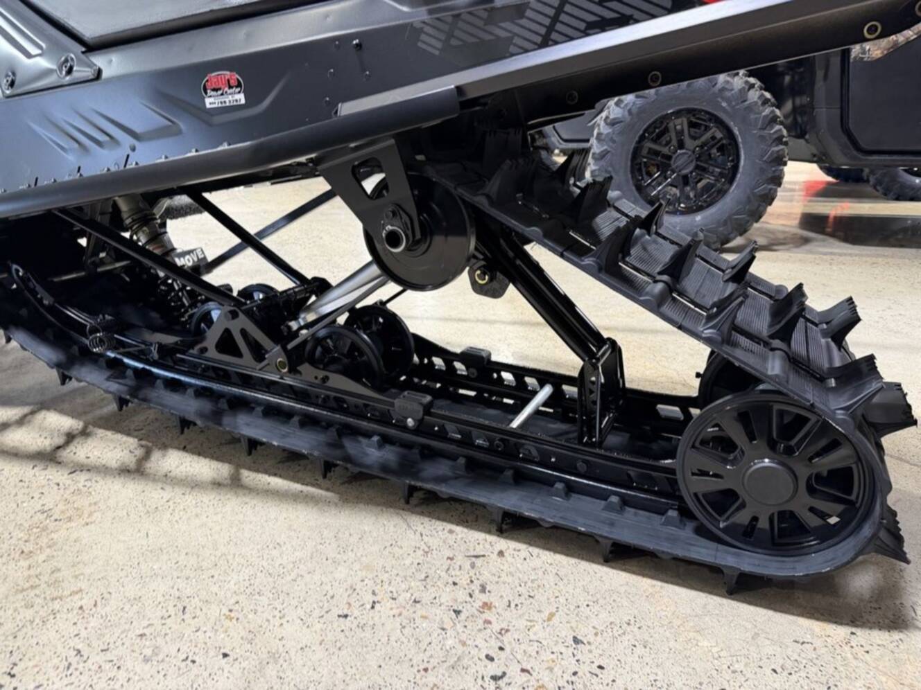 A photo of this 2026 Ski-Doo Backcountry Adrenaline® 850 E-TEC Storm 1.5_Black