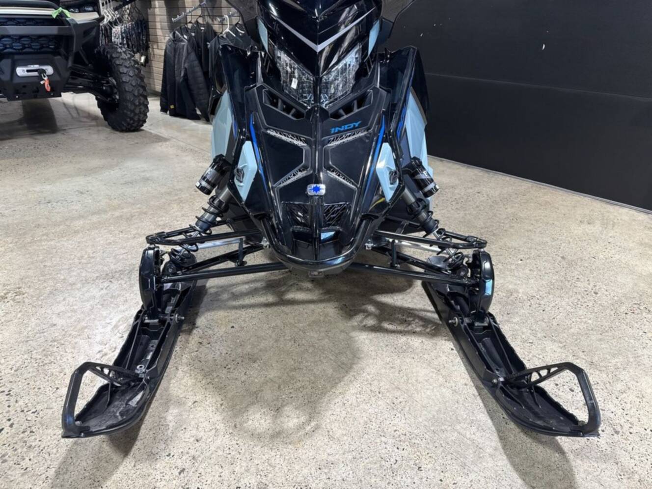 A photo of this 2026 Polaris® 650 INDY XC 137 Gloss Black / Blue Dusk
