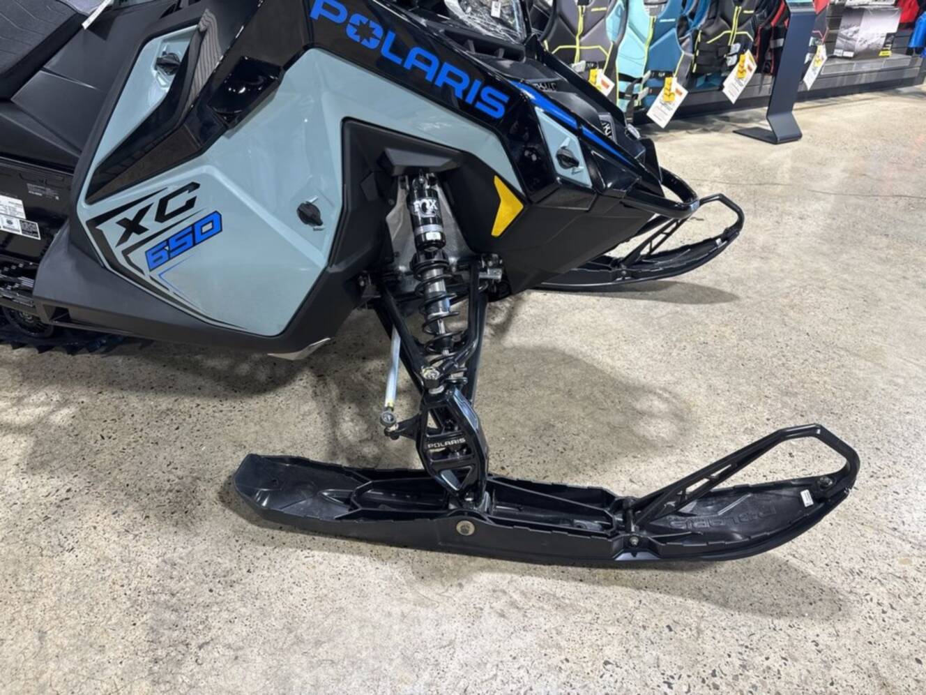 A photo of this 2026 Polaris® 650 INDY XC 137 Gloss Black / Blue Dusk