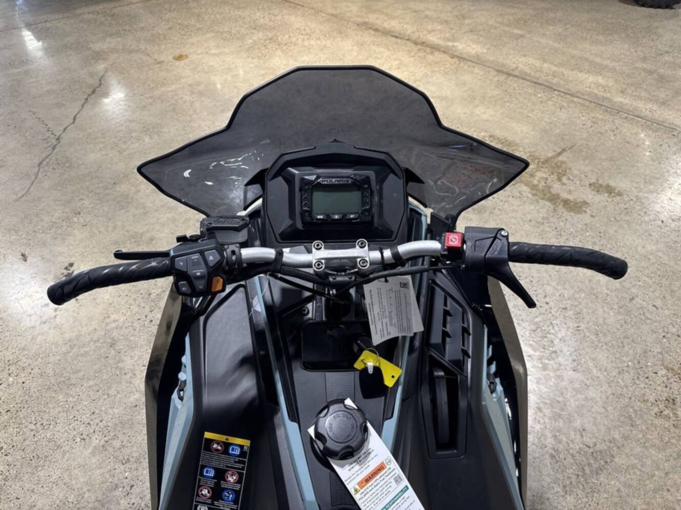 A photo of this 2026 Polaris® 650 INDY XC 137 Gloss Black / Blue Dusk